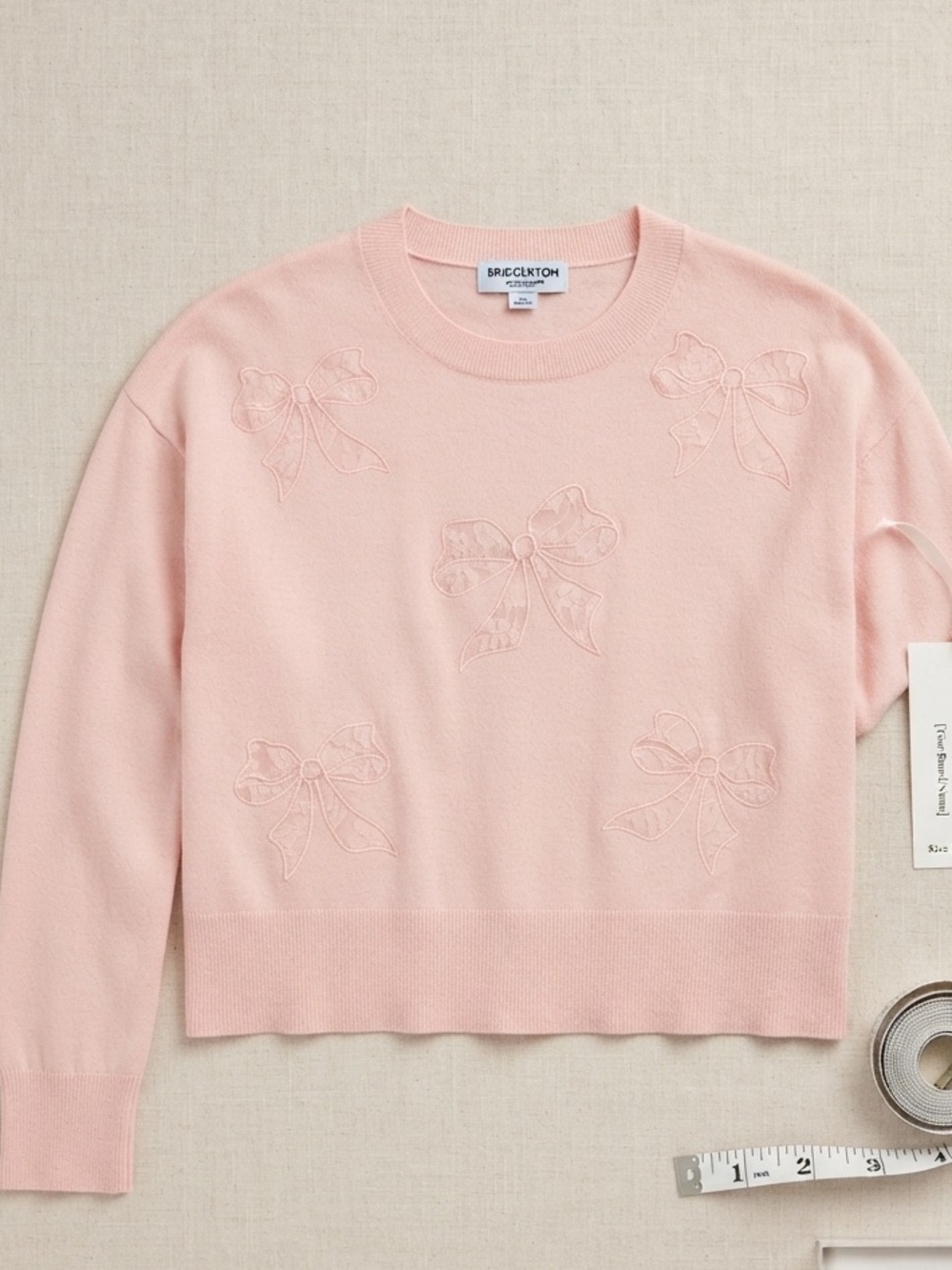 Netflix Pale Pink Bow-Appliqué Crewneck Sweater - Picture 1 of 3
